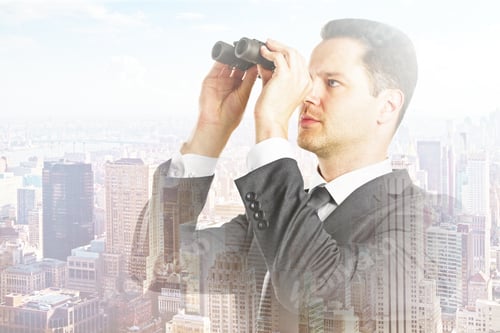 Preview: Businessman With Binoculars On City Background. Double Exposure. Research Concept