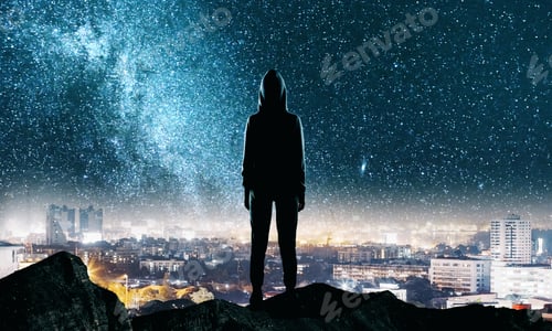 Preview: Back View Of Hacker Standing On Top Of Hill With Night Starry Sky And City Skyline Background