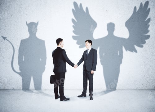 Preview: Businessmen With Angel And Demon Shadows Shaking Hands In Concrete Interior. Teamwork Concept
