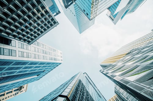Preview: Bottom View Of Skyscrapers On Bright Blue Sky Background. Urban And Professional Concept