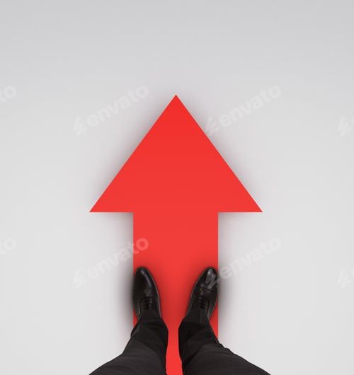 Preview: Businessman Standing On Red Arrow O A White Background