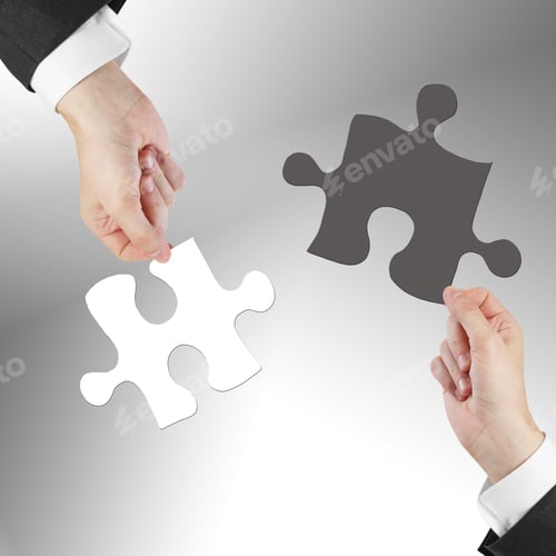 Preview: Two Hands Holding Puzzle Isolated On Gray