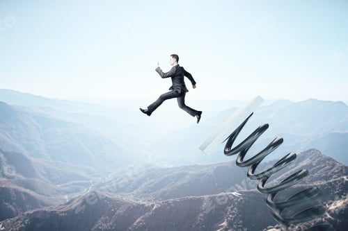 Preview: Businessman In Suit On Start Up Mechanism. Entrepreneurship And Launching Concept