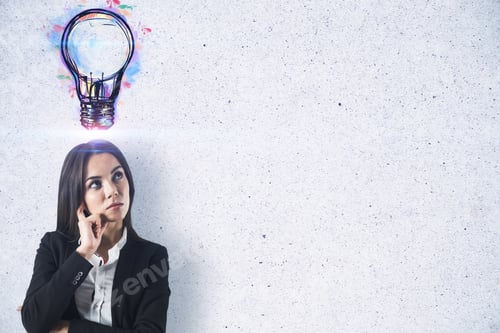 Preview: Portrait Of Attractive Young European Businesswoman With Creative Light Bulb Sketch On Concrete