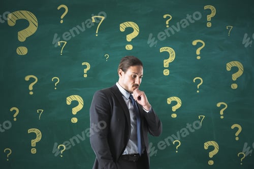 Preview: Portrait Of Attractive Thoughtful Young European Man On Chalkboard Wall Background With Question