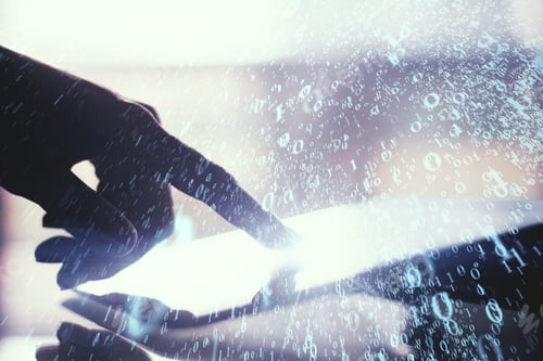 Preview: Backlit Hand Using Tablet With Binary Code On Blurry Background. Communication And Computing