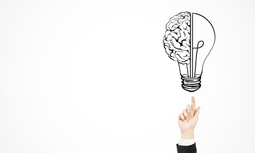 Preview: Hand Pointing At Creative Light Bulb Brain Sketch On White Background. Idea And Brainstorm Concept