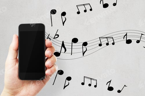 Preview: Male Hand Holding Empty Smartphone On Concrete Background With Notes. Music, Leisure, Device And