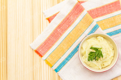 Preview: Warm Mashed Potatoes In A Ceramic Bowl With Fresh Parsley. On A Vintage Linen Napkin On A Wooden