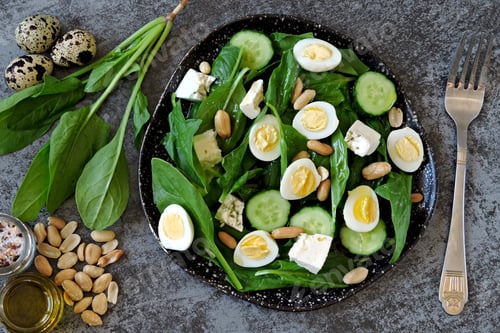 Preview: Keto Diet. Salad With Spinach, Quail Eggs And Peanuts. Keto Salad Healthy Diet.