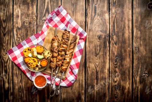 Preview: Grilled Vegetables With A Fragrant Shish Kebab From Mutton.On Wooden Background.