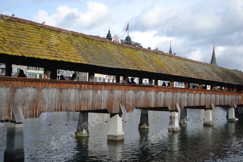 Preview: The Chapel Bridge And Lake Lucerne, In The City Of Lucerne, Switzerland.