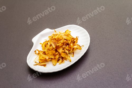 Preview: Tuna Shaving Katsuobushi, Bonito Flakes, Ingredient Of Japanese Soup Dashi. In A White Shell-Shaped
