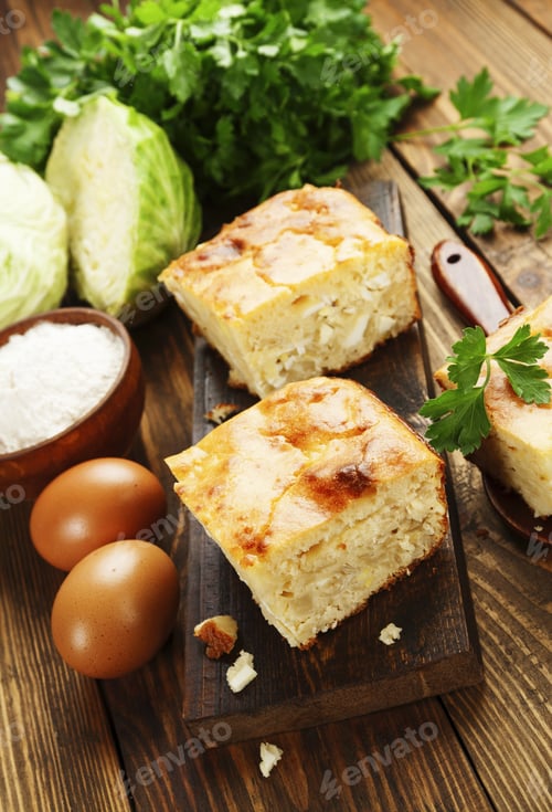 Preview: Pie With Cabbage And Eggs On The Table