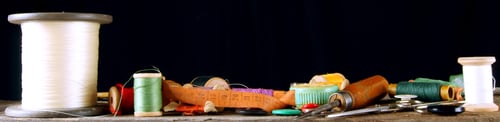 Preview: Sewing Accessories On Board. On Black Background.