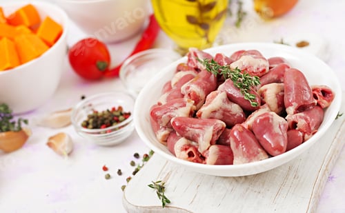 Preview: Ingredients For Cooking Chicken Hearts With Pumpkin And Tomatoes In Tomato Sauce. The Garnish Is