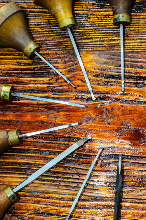 Preview: Different Gravers For Jewelry On A Wooden Background