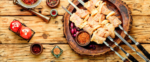 Preview: Uncooked Raw Pork Skewers In Marinade, On Skewers.