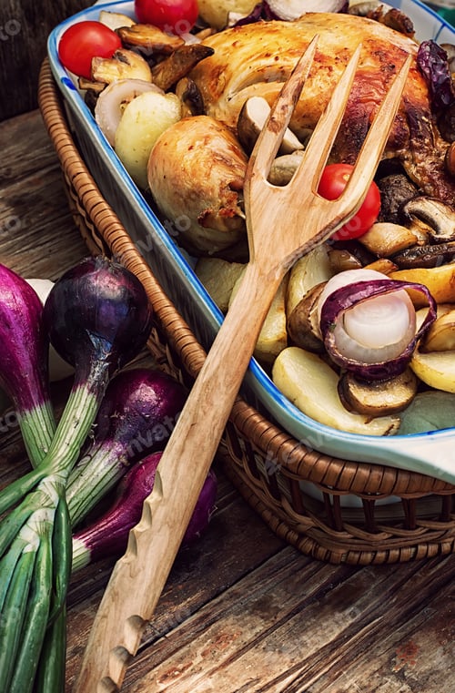 Preview: Young Chicken Baked With Potatoes,Mushrooms And Vegetables In The Baking Dish.