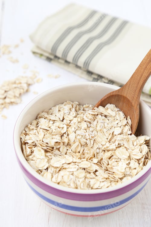 Preview: Oat Flakes In A Bowl On Wooden Background