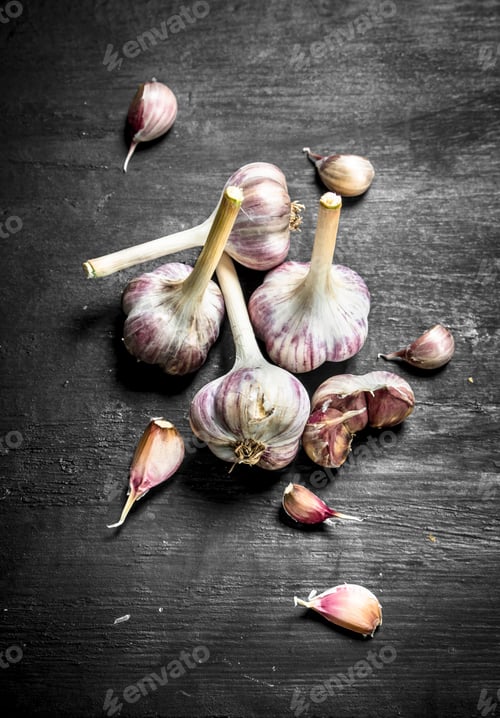 Preview: Fresh Spicy Garlic. On A Black Chalkboard.