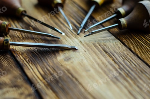 Preview: Different Gravers For Jewelry On A Wooden Background