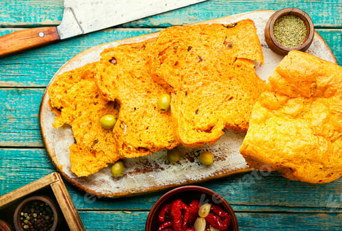 Preview: Homemade Sliced Bread With Sun-Dried Tomatoes On Wooden Table
