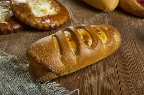 Preview: Kurnik , Russian Traditional Chicken Pies Piroshki , Assorted Pastry: Dishes, Top View.