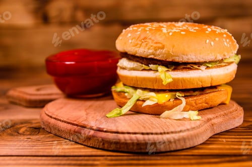 Preview: Hamburger And Sauce On Rustic Wooden Table