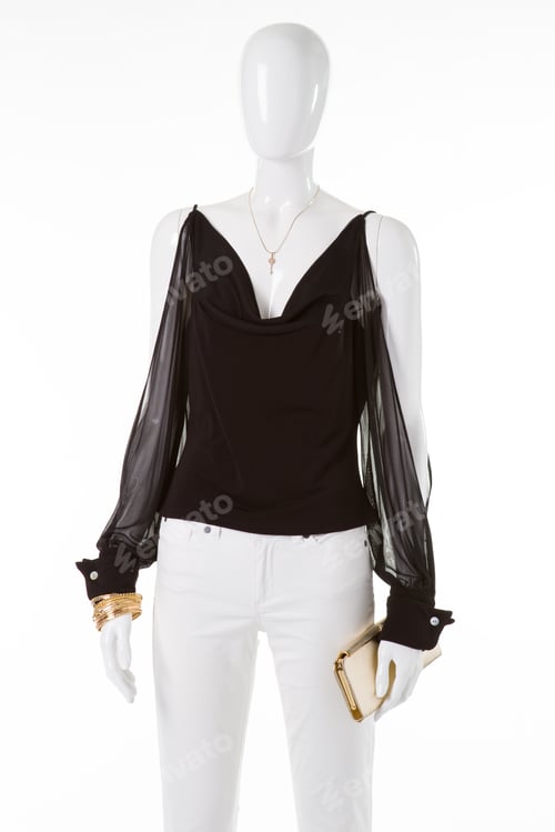 Preview: Mannequin Holding Beige Clutch Bag. Blouse With Cutouts On Sleeves. New Jewelry In Mall. Discounts