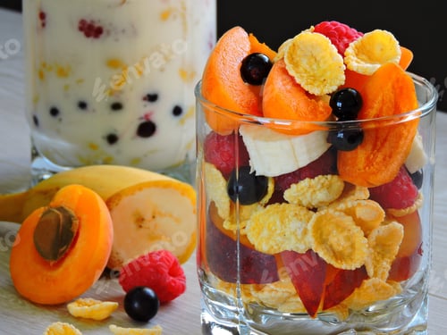 Preview: Useful Breakfast With Fruit Berries Flakes And Yogurt. Berries Fruit Flakes. Close Up.