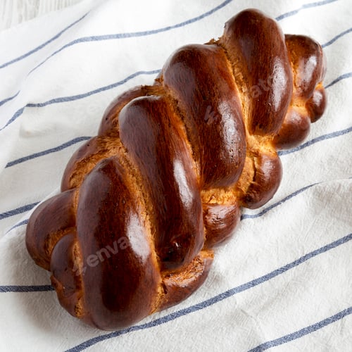 Preview: Homemade Challah Jewish Bread On Cloth, Closeup. Jewish Pastries.