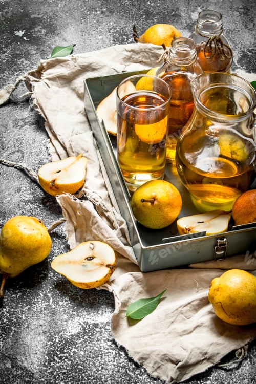 Preview: The Fresh Juice Of Pears. On Rustic Background.