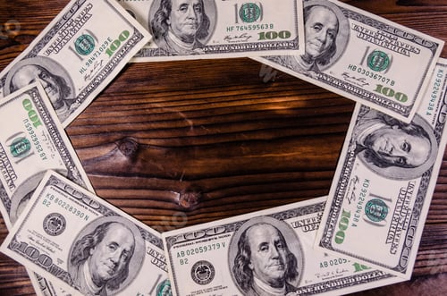 Preview: Frame Of The One Hundred Dollars Bills On Rustic Wooden Table. Top View