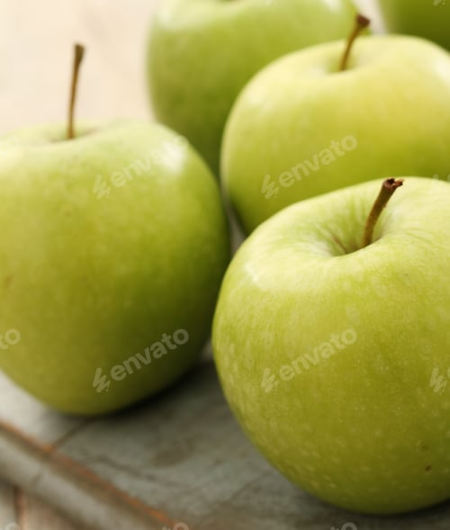 Crisp Green Apples on a Rustic Cutting Board