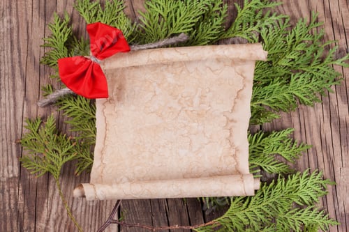 Preview: Sheet Of Paper With Christmas Decoration On Wooden Background