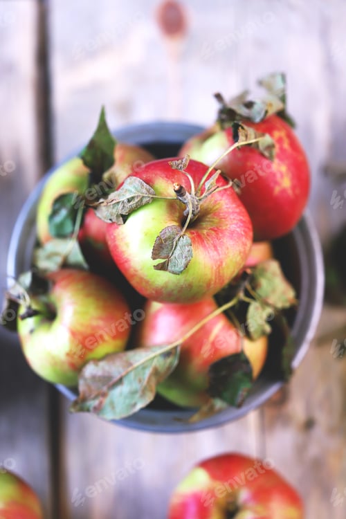 Preview: Fresh Apples In A Bowl On A Wooden Surface. Harvest Apples.