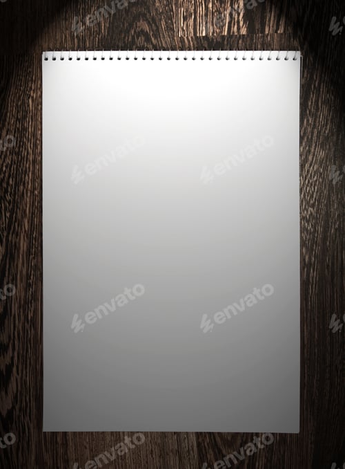 Preview: Notebook On A Wooden Background.