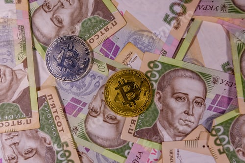 Preview: Bitcoin Coins On Ukrainian Five Hundred Hryvnas Banknotes