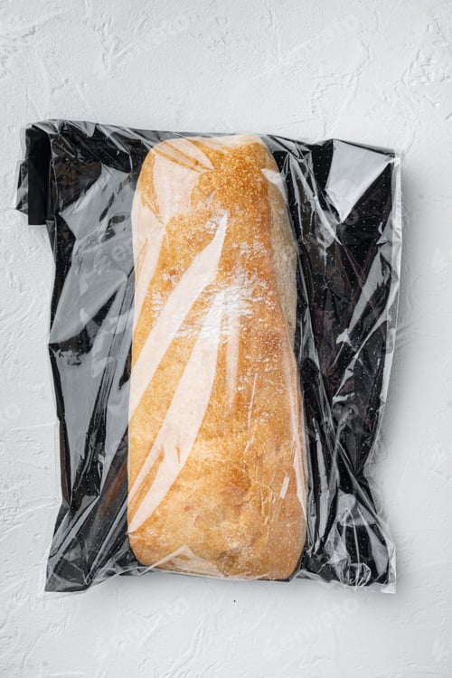 Preview: Ciabatta In A Plastic Bag, On White Background, Top View Flat Lay