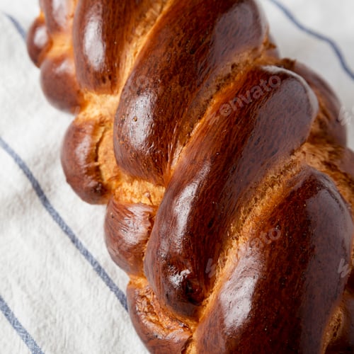Preview: Homemade Jewish Challah Bread On A White Wooden Background, Close-Up.