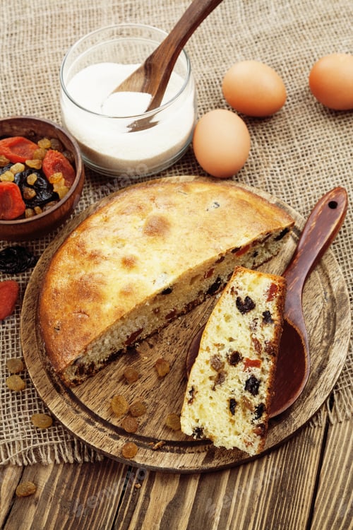 Preview: Semolina Cake With Dried Fruits On A Cutting Board. Mannik