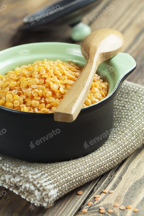 Preview: Red Lentils In The Pot On The Wooden Table