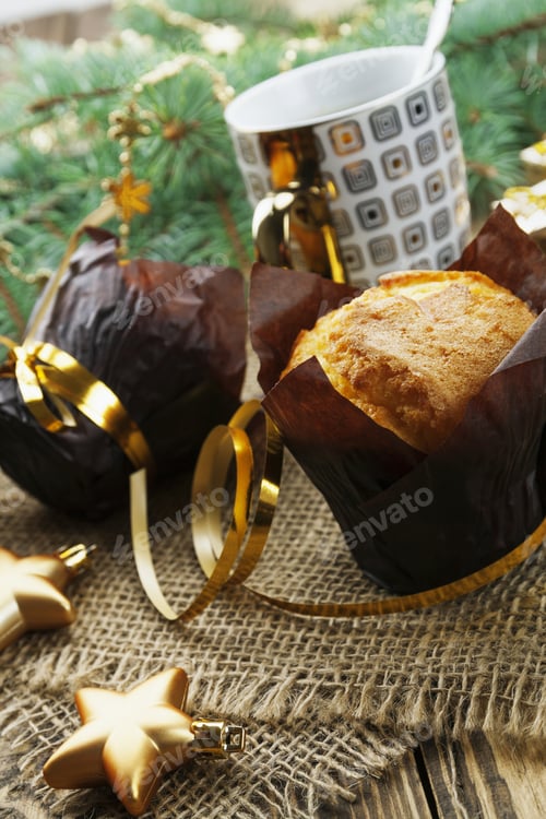Preview: Muffins And Cup Of Coffee On The Holiday Table