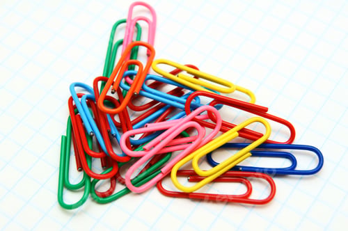 Preview: Multi-Coloured Paper Clips. On A White Background.