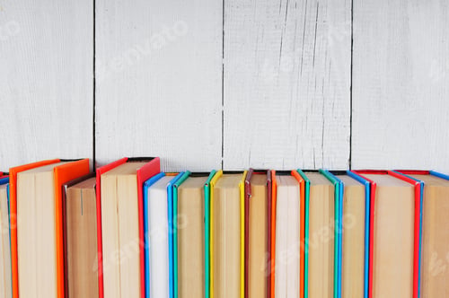 Preview: Books. On A Wooden, White Background.