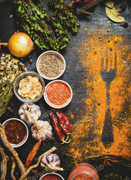 Preview: Indian Spices And Herbs. Print Of Ground Spices On The Table. On The Black Chalkboard.