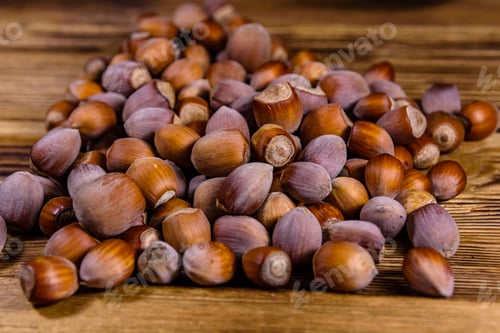 Preview: Pile Of The Hazelnuts On Rustic Wooden Table