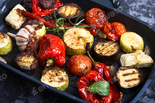 Preview: Grilled Vegetables In A Frying Pan On A Blue Concrete Background