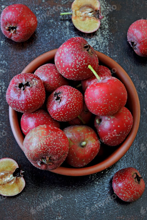 Preview: Hawthorn In A Ceramic Bowl On A Stylish Shabby Background. Berries Of Hawthorn.
